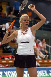 Carola Bott badminton serve.