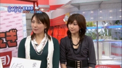 Reiko Shiota and badminton partner Kumiko Ogura in a TV interview.
