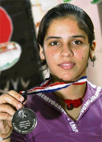 Picture of Saina Nehwal with medal.